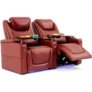 two reclining chairs with trays and plates on them