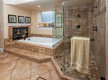 a bath room with a tub and a fire place