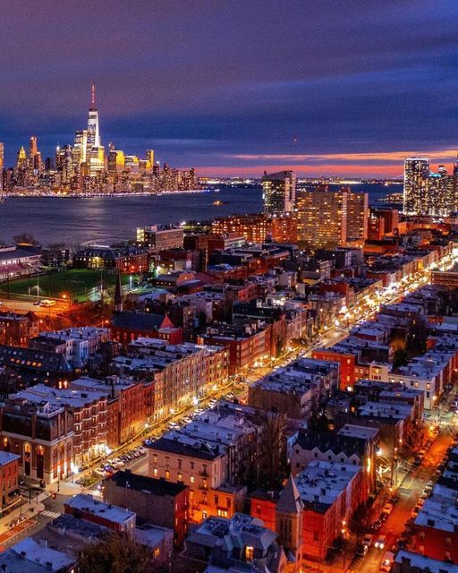 an aerial view of the city at night