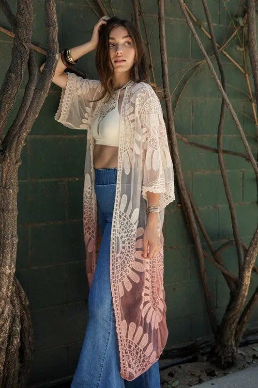 Ombre Kimono Bid farewell to mundane long cardigans - this ombre kimono is the ultimate fusion of boho lace and whimsical, teasing sleeves. You'll radiate a dreamy vibe while staying cozy AF. It's the perfect harmony of style and ease, my friend! Product Description One Size Fits MostSizes: 0-12Length: 49"Bust Across: 23"Sleeve Length: 15"Sleeve Opening: 10" Style: Casual Print / Pattern: Crochet Fit: Regular Sleeve: 3/4 Length: Maxi Closure: Open Lining: No Fabric Contents: 100% Polyester Non-s Crochet Kimono Outfit, Lace Cardigan Outfit, Long Lace Cardigan, Kimono Outfits, Long Cardigans, Crochet Kimono, Sheer Kimono, Boho Cardigan, Kimono Duster