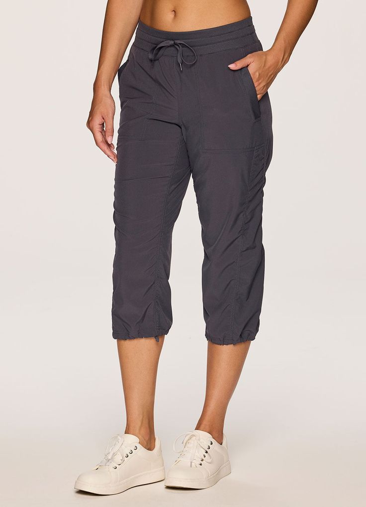 Stretch out in style with our relaxed fit Lumen Lightweight Capri Pant. Lightweight stretch woven fabric allows you to move without restriction, while moisture wicking properties help it to dry quickly to keep you dry and comfortable. Sizable pockets provide convenient on-the-go storage, and an elastic waistband and drawstrings at the waist and leg openings allow for a more customized fit. These best selling relaxed fit capri pants are just the ticket no manner what the activity. Available in ex Stretch Pants With Functional Drawstring For Outdoor Activities, Stretch Pants With Functional Drawstring For Outdoor, Outdoor Activewear Long Pants With Side Pockets, Stretch Functional Parachute Pants For Outdoor Activities, Athleisure Activewear For Outdoor Activities With Elastic Waistband, Athleisure Activewear With Elastic Waistband For Outdoor Activities, Athleisure Activewear With Elastic Waistband For Outdoor, Stretch Activewear With Functional Drawstring For Outdoor, Moisture-wicking Relaxed Fit Bottoms For Outdoor