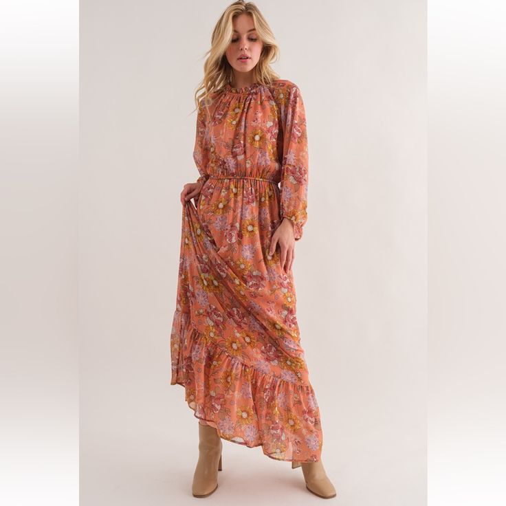 Floral Print Tiered Maxi Dress -Floral Print -Tiered Detail -Maxi Dress -Elastic At The Waist, Cuff, And Neck -Ruffle At Neck -Shirring Detail Fall Floral Print Orange Maxi Dress, Orange Floral Print Long Sleeve Maxi Dress, Red Floral Print Maxi Dress For Fall, Flowy Orange Maxi Dress For Fall, Spring Orange Maxi Dress, Flowy Orange Dress For Daywear, Orange Midi Dress For Fall Daywear, Orange Floral Print Casual Midi Dress, Striped Knit Dress