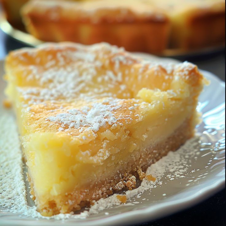 a piece of pie sitting on top of a white plate