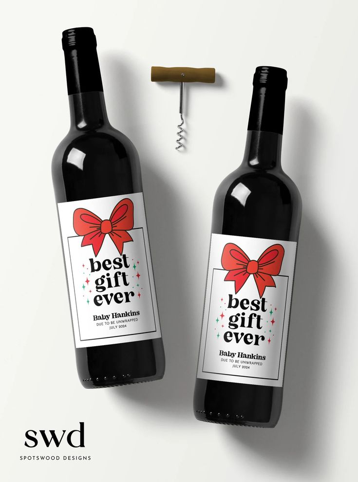 two bottles of red wine next to a corkscrew with the words best gift ever on it