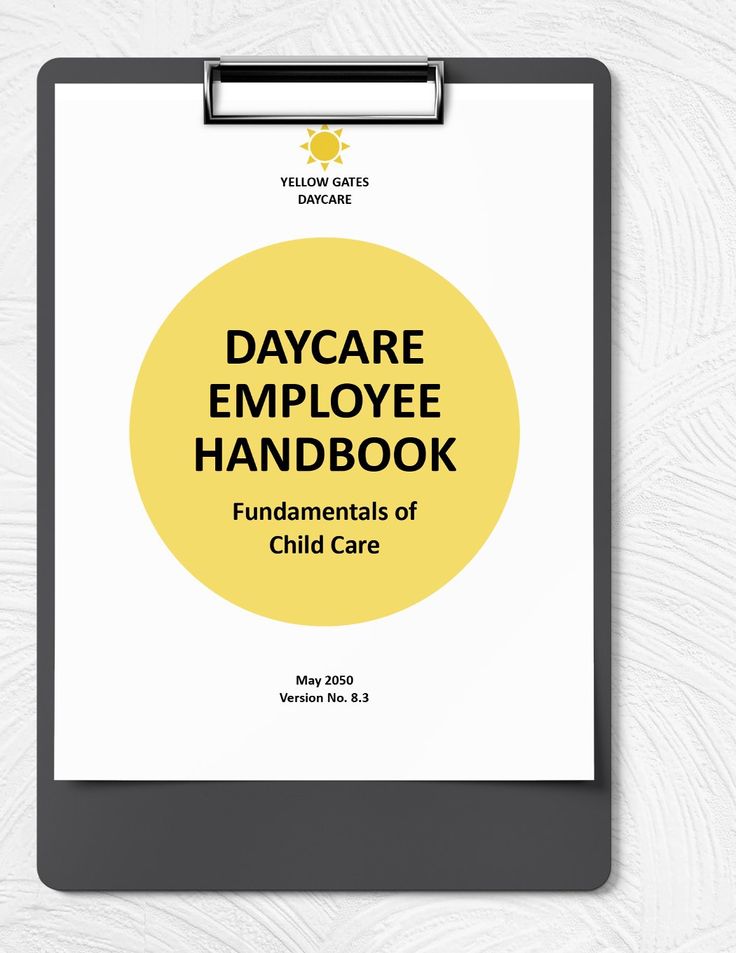 a clipboard with the title'day care employee handbook'in yellow on it