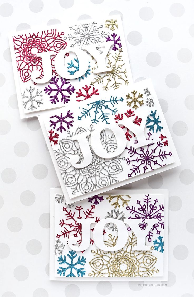 three cards with snowflakes on them and one has the number 50 in it