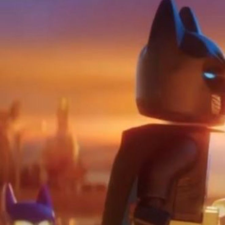 the lego batman movie character is standing in front of a cityscape at sunset