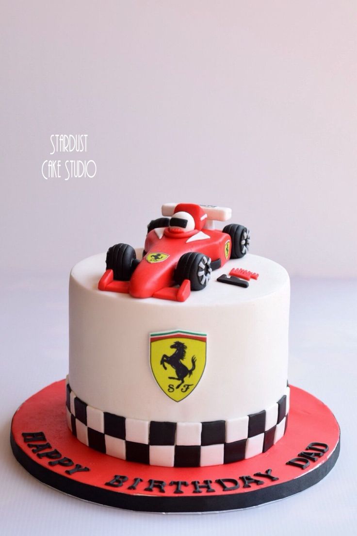 a birthday cake with a racing car on top