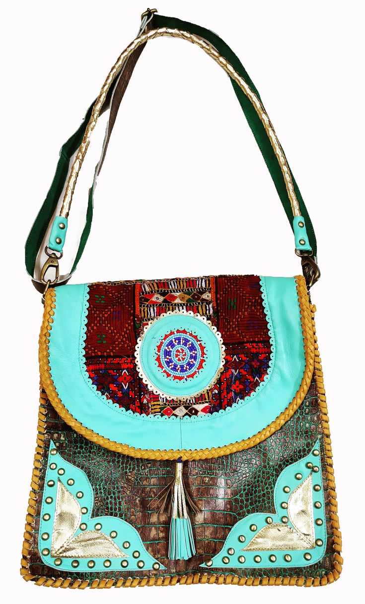 Item Description Available in Wholesale around You will get as much Pisces as you want around 50 pic, Indian Bohemian Crocodile Printed 100% Leather Bag Boho Bag Vintage Banjara Afghani Handmade Embroidery Mirror Work Bag Triba Shopping Shoulder Bag BANJARA ETHNIC VINTAGE EMBROIDERY HANDMADE TRIBAL BOHO SHOULDER BAG Walk on the wild side with this gorgeous clean new Banjara embroidered Crocodile Printed 100% leather tote bag from India. One of a kind! Stunning Crocodile Printed design, hand embr Bohemian Multicolor Leather Satchel, Bohemian Hand-stitched Crossbody Bag, Rectangular Handwork Festival Bag, Festival Tote Shoulder Bag With Hand-stitched Details, Handmade Festival Pouch Bags, Leather Bag With Removable Pouch For Festivals, Traditional Leather Bags With Removable Pouch, Festival Hand-stitched Crossbody Shoulder Bag, Festival Crossbody Shoulder Bag With Hand-stitched Details