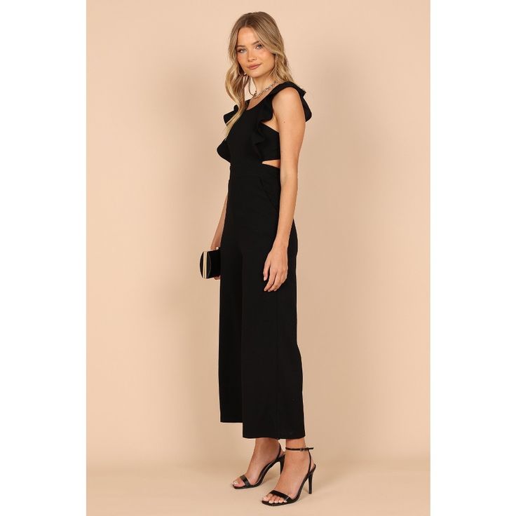 Looking for a jumpsuit that will make you feel like the life of the party? Look no further than this round neckline beauty! Featuring non adjustable straps with ruffle detail and a back opening with tie close, it's sure to turn heads. Sleeveless Cutout Jumpsuit For Night Out, Elegant Ruffled Jumpsuits And Rompers For Date Night, Chic Jumpsuits And Rompers With Ruffled Straps For Spring, Chic Spring Jumpsuits And Rompers With Ruffled Straps, One-piece Ruffled Jumpsuits And Rompers For Party, Chic One-piece Jumpsuit For Evening, Chic Evening One-piece Jumpsuits And Rompers, Elegant Ruffled Jumpsuits And Rompers For Brunch, Black Sleeveless Ruffled Jumpsuit