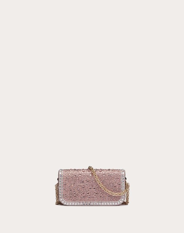 Valentino Garavani Locò small shoulder bag with rhinestone appliqué and Swarovski® covered VLogo Signature element. Equipped with both a detachable sliding chain strap and a detachable handle, this accessory can be worn as a crossbody/shoulder bag or carried as a handbag. - Magnetic closure - Removable leather handle - Removable sliding chain shoulder strap - Nappa leather lining. Interior: one slip pocket Shoulder strap drop length: min. 33 cm to max. 55 cm / min. 12.9 in. to max. 21.6 in. - Di Designer Evening Bag With Sequins, Designer Evening Bags With Sequins, Designer Sequined Evening Bags, Designer Sequin Bags For Formal Occasions, Luxury Evening Bags With Sequins, Rose Gold Clutch Bag For Evening, Luxury Sequin Bags For Evening, Luxury Sequined Rectangular Evening Bag, Rose Gold Clutch For Evening