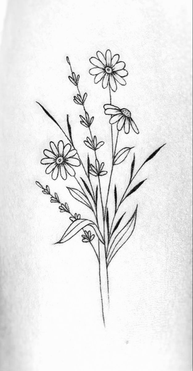 a black and white drawing of flowers on the back of a woman's stomach