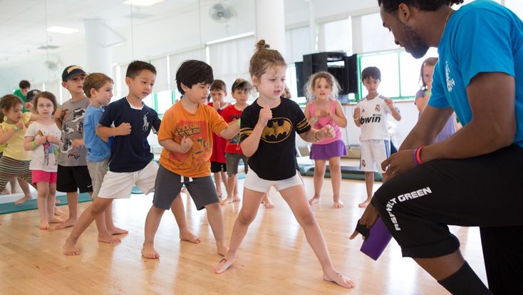 a group of children in a dance class