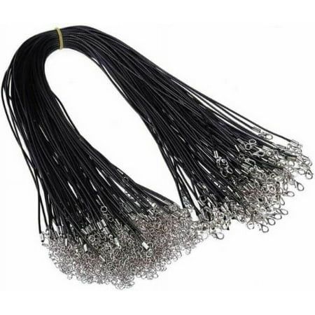 black string with silver beads on white background