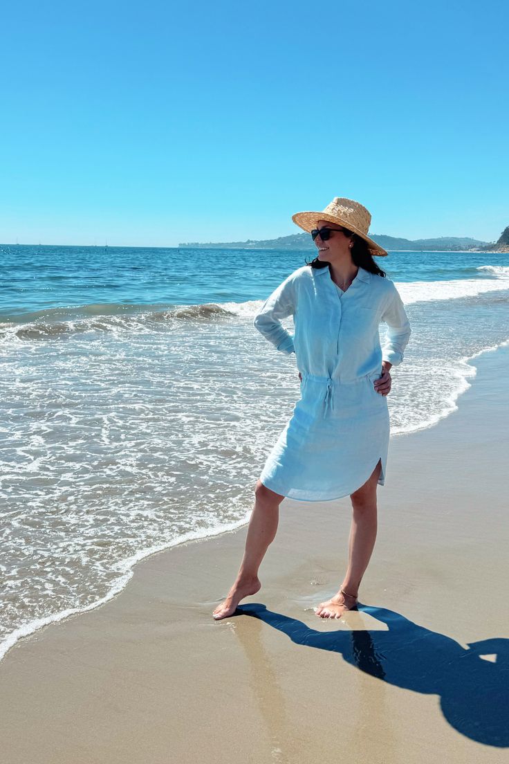 Subtle sophistication and contemporary style come together in this oversized, collared shirt dress in blue with a front pocket and adjustable drawstring. Details Made from 100% HempOversized shirtdress Front drawstringPockets on both sidesRoselyn is 5'7" and is wearing size XS Blue Shirt Dress For Spring Beach Outing, Elegant Collared Shirt Dress For Beach, Casual Blue Shirt Dress For Vacation, Blue Collared Relaxed Fit Shirt Dress, Blue Relaxed Fit Collared Shirt Dress, Blue Collared Shirt Dress With Relaxed Fit, Light Blue Shirt Dress For Beach In Spring, Light Blue Shirt Dress For Spring Beach Outing, Light Blue Shirt Dress For Spring Beach