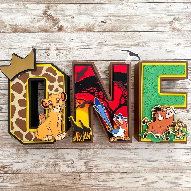 the word disney spelled out in wooden letters