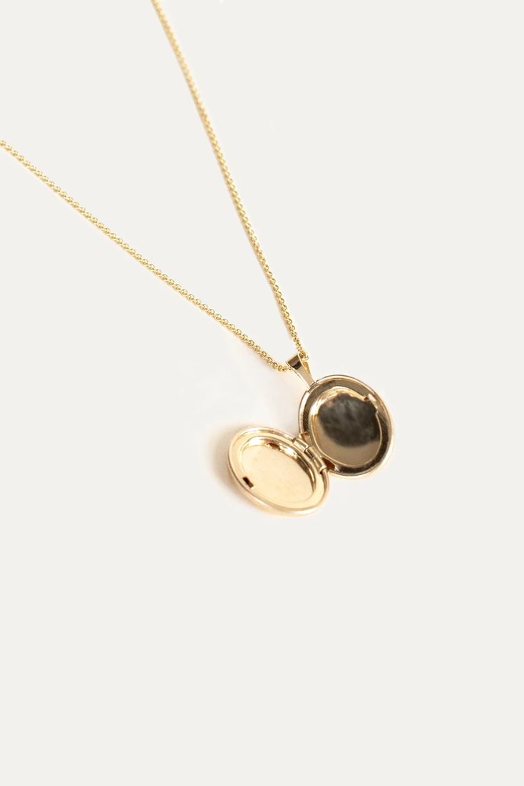 Maison Gold Oval Locket Necklace – Kinn 14k Gold Oval Link Locket Jewelry, Timeless Gold Oval Locket Necklace, Oval Keepsake Jewelry In 14k Gold, Classic 14k Gold Locket Necklace For Keepsake, Classic 14k Gold Locket Necklace Keepsake, Keepsake 14k Gold Oval Jewelry, Timeless Oval Locket Necklace For Gift, Elegant 14k Gold Locket Necklace For Keepsake, Timeless Yellow Gold Oval Locket Necklace