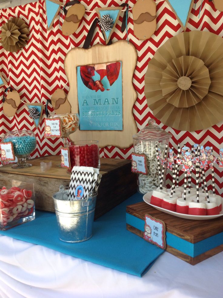 the dessert table is decorated with red, white and blue items