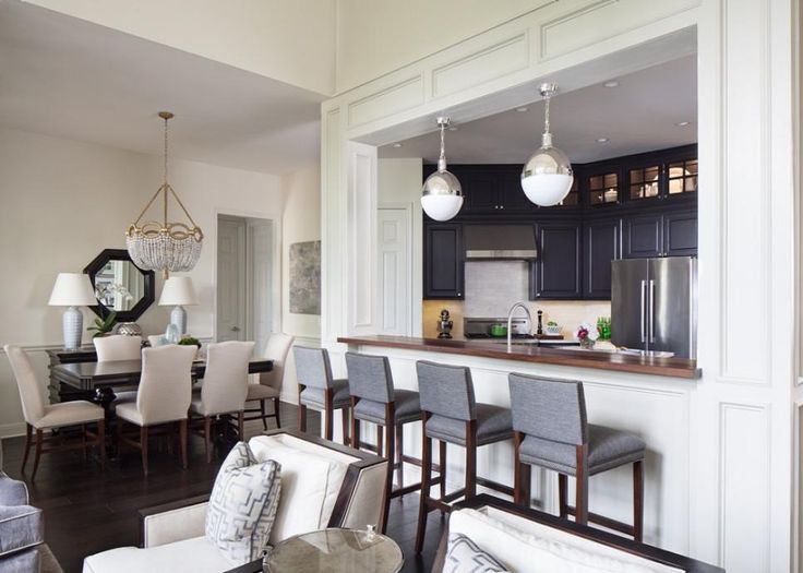 a dining room and kitchen area are shown in this house's open floor plan