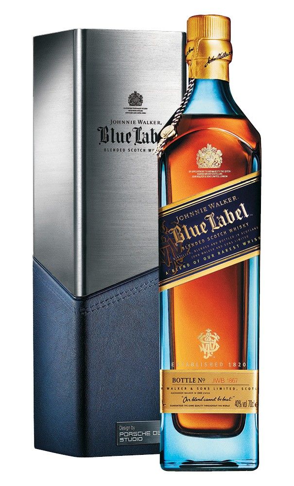 a bottle of blue label whisky next to a box