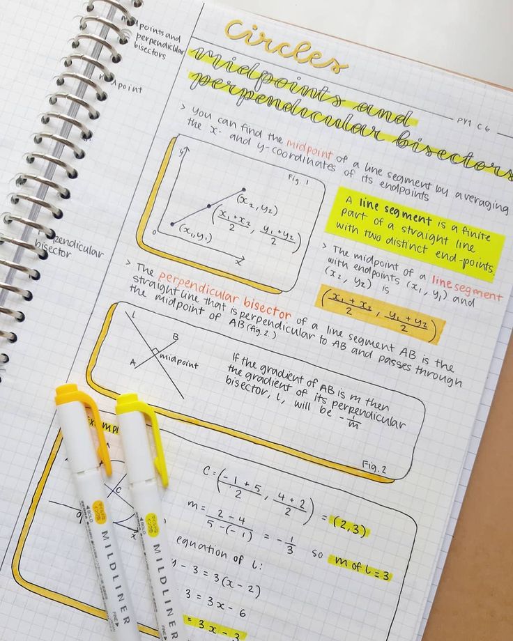 a notebook with some writing on it and two pens next to the pages that are written in yellow