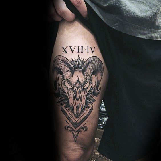 a man with a goat head tattoo on his leg that says vix - vi