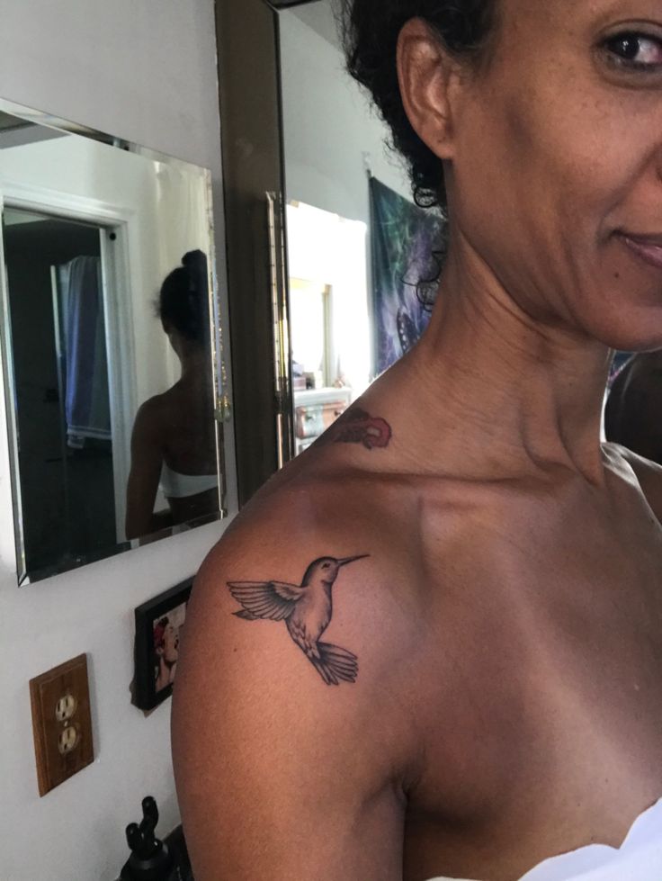 Hummingbird Small - Black on medium  dark skin tone Tattoos On Brown Skin Women, Tan Skin Tattoos, Brown Ink Tattoo On Brown Skin, Tattoo On Tan Skin, Dark Brown Tattoo, Tattoos On Dark Skin Women, Brown Skin Tattoo, Tattoos Brown Skin, Tattoo Ideas Dark Skin