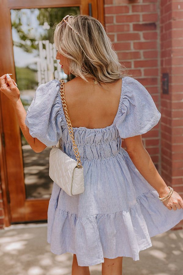 - Chic and sassy, this sweet dress will make you want to twirl! With its stripe pattern and flirty mini dress cut, it puts a modern twist on classic style. Whether you are meeting up for brunch or strolling down the boardwalk, this cutie is sure to steal the show. - Unlined linen blend material with a blue and white stripe pattern - An elastic square cut neckline - Short, puff sleeves with elastic cuffs - A smocked waistline - A flattering silhouette that ends in a ruffled mini dress hemline Long Sweater Dress, Linen Mini Dress, Swimwear Dress, Sparkly Dress, Black Dresses Casual, Little White Dresses, Curve Dresses, Square Cut, Sweet Dress