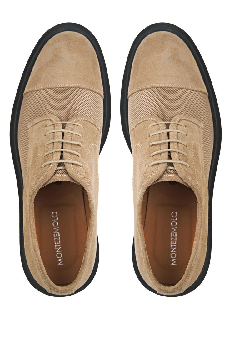 Combining modern style with unbeatable comfort, these shoes are crafted from premium suede leather, showcasing a perfect balance of durability and elegance. The fabric upper adds a contemporary touch to the classic derbies design. What sets these shoes apart are their standout features: a high, lightweight rubber commando sole for traction and bold style. Inside, enjoy the plush comfort of soft calf leather lining and insole. These shoes blend style, durability, and luxury, making them essential Suede Lace-up Shoes With Cap Toe And Leather Sole, Classic Suede Lace-up Shoes With Leather Sole, Suede Lace-up Oxfords For Business, Business Suede Lace-up Oxfords, Suede Brogue Lace-up Shoes For Business, Business Suede Wingtip Lace-up Shoes, Suede Wingtip Leather Shoes For Business Casual, Modern Lace-up Shoes With Textured Sole For Business, Modern Business Casual Lace-up Shoes With Leather Sole