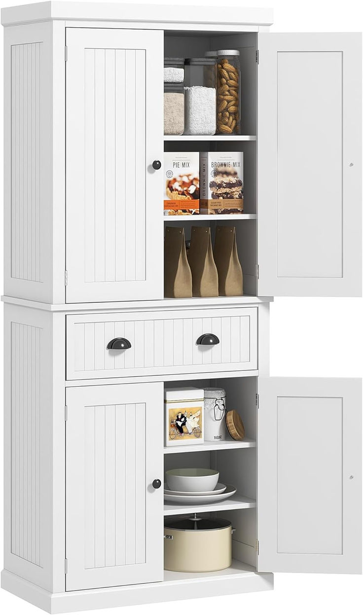 two white cupboards with open doors and drawers