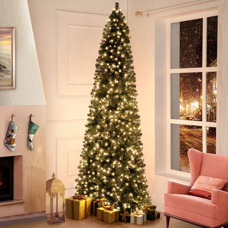 PRICES MAY VARY. SLIM & MODERN DESIGN : Our Vienna Slim Pre-Lit Artificial Christmas Tree is a gorgeous tree that can transform your home this holiday season! Its slim shape gives a touch of rarity to your holiday home décor. COMES PRE-LIT TO SAVE YOU TIME : The Skinny Christmas Tree comes Pre-lit with 350 incandescent lights that make setting up your tree a breeze. These lights emit a warm glow that highlights your decorations and holiday gifts making your place extra-special. LOOKS REALISTIC & Christmas Slim Trees, Slim Pre Lit Christmas Tree, 7 Foot Slim Christmas Tree, Christmas Tree With Just Lights, Christmas Tree Minimalist, Office Christmas Tree, Tall Christmas Tree, Seasonal Room, Pencil Tree