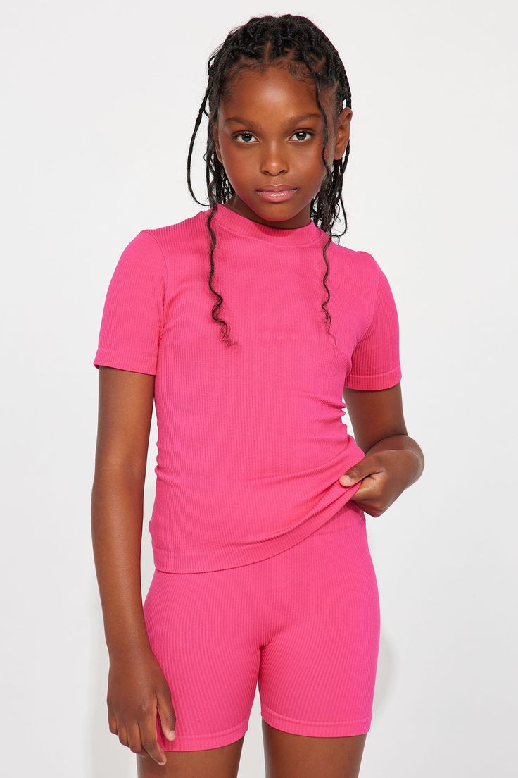 Available In Fuchsia, Black, And White. Seamless Short Sleeve Crew Neck Cropped Model Wears Size 10/12 93% Polyamide 7% Spandex Imported | Mini Catching A Sweat Seamless Tee Shirt in Fuchsia size 14/16 by Fashion Nova Pink Ribbed Stretch T-shirt, High Stretch Ribbed Pink Top, Pink Ribbed Crew Neck T-shirt, Snug Fit Summer Tops, Pink High Stretch Seamless Top, Pink Ribbed Fitted T-shirt, Fitted Ribbed Pink T-shirt, Fitted Pink Ribbed T-shirt, Pink Fitted Ribbed T-shirt