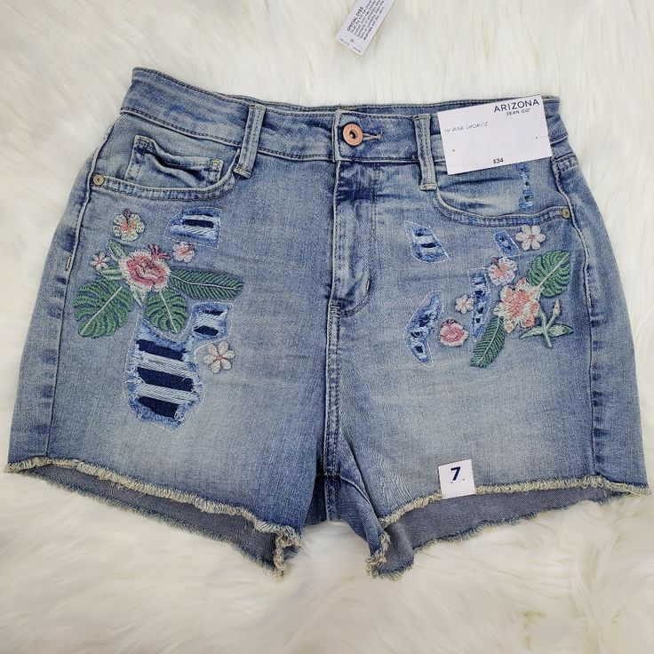 "New" Arizona Women's Juniors High Rise Denim Shortie Embroidered Flowers Condition Is "New With Tags". Please Check The Measurements To Decide Upon Fit Measurements(Taken With The Garment Laying Flat): Size 3 Inseam 2.5" Waist 13" Front Rise 11" Back Rise -- 14" Suze 7 Inseam 2.5" Waist 13.5" Front Rise 11" Back Rise -- 14.5" If Something Is Not Clear First Ask Then Purchase. Epm/Wp Embroidered Medium Wash Denim Jean Shorts, Embroidered Medium Wash Cotton Jean Shorts, Embroidered Denim Blue Jean Shorts, Embroidered Cotton Jean Shorts In Medium Wash, Embroidered Denim Jean Shorts In Blue, Trendy Blue Jean Shorts With Floral Embroidery, Blue Cutoff Jean Shorts With Floral Embroidery, Blue Floral Embroidered Cutoff Jean Shorts, Blue Floral Embroidery Cutoff Jean Shorts