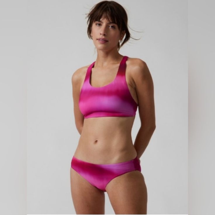 New With Tags Athleta Malibu Bikini Top Color: Surf Blur Fushsia Size: Medium A-C For: Swim, Surf, Stand-Up Paddleboard, And All Water Sports Feel: Recycled H2eco Swim Fabric Is Smooth And Sleek With Powerful Stretch Fave: Hidden Underwire Design Supports Like Your Favorite Bra 80% Recycled Nylon/20% Lycra Spandex Quick-Drying: Dries In A Flash For Ultimate Comfort When Breaking A Sweat Rated Upf 50+ (Excellent Protection) All-Around Stretch: Provides Ultimate Comfort And Mobility Sustainable: M Pink Sleeveless Seamless Tankini, Sleeveless Pink Seamless Tankini, Summer Training T-back Swimwear, Sporty Pink Swimwear For Poolside, Stretch Racerback Swimwear For Gym, Summer Sportswear Swimwear, Pink Racerback Stretch Swimwear, Pink Racerback Swimwear Stretch Fit, Pink Stretch Racerback Swimwear