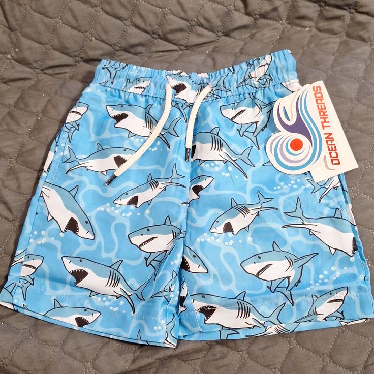 New Toddler Swimming Shorts Inside Shorts Has Mesh Material. 100% Polyester Playful Blue Swim Trunks With Elastic Waistband, Playful Blue Bottoms With Built-in Shorts, Playful Blue Shorts For Beach Season, Summer Bottoms With Elastic Waistband For Playtime, Casual Swim Trunks For Playtime At The Beach, Casual Swim Trunks For Beach Season Playtime, Casual Swim Trunks For Summer Playtime, Casual Swim Trunks For Summer Playwear, Summer Playtime Bottoms Short Length