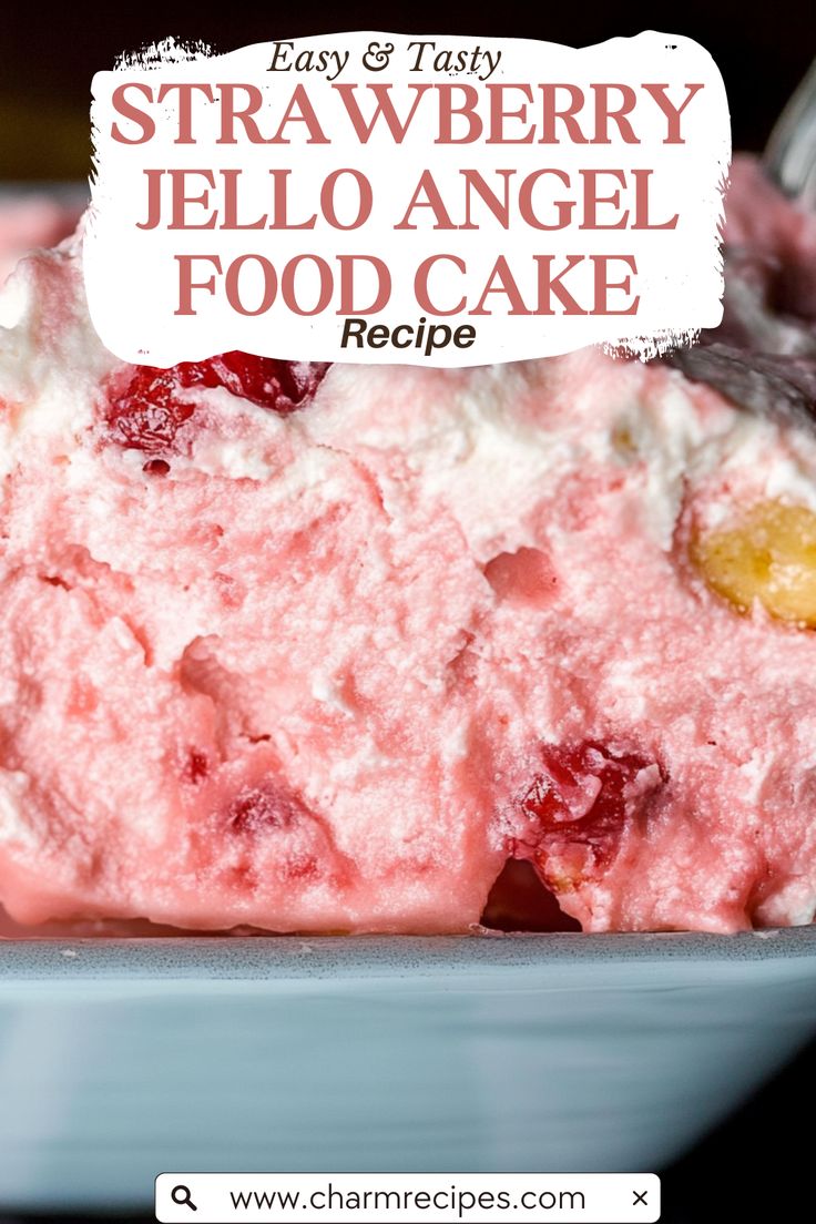 strawberry jello angel food cake on a blue plate with a white sign above it