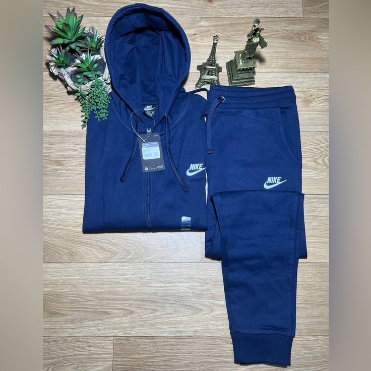 Unisex Zip Up Hoodie Jogger Set-Navy Blue Blue Nike Hoodie For Loungewear, Nike Blue Hoodie For Loungewear, Blue Hooded Tracksuit For Streetwear, Blue Tracksuit For Winter Streetwear, Blue Winter Tracksuit For Streetwear, Blue Cotton Long Sleeve Tracksuit, Blue Long Sleeve Cotton Tracksuit, Nike Blue Sweats For Loungewear, Nike Casual Long Sleeve Tracksuit