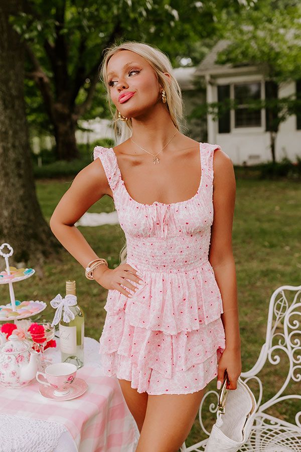 - Slip into this bubbly romper and let the good times roll! The tiered design adds a touch of whimsy, while the romper silhouette offers comfort and versatility. Effortlessly blending elegance with playfulness, this charming piece is perfect for brunch with friends or a sunny garden party. - Unlined lightweight material with a pink and red hued floral print and a dot texture - An elastic scoop cut neckline with a tie detail and a keyhole accent - Wide straps with elastic cuffs - A smocked waistl Grade Dresses, Cute Yellow Dresses, Two Piece Romper, Sunny Garden, Rush Outfits, Dot Texture, Let The Good Times Roll, Pink Rompers, Romper Outfit