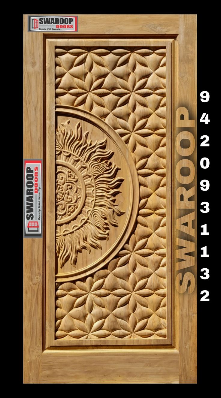 the front door is made out of wood and has an intricate carving pattern on it