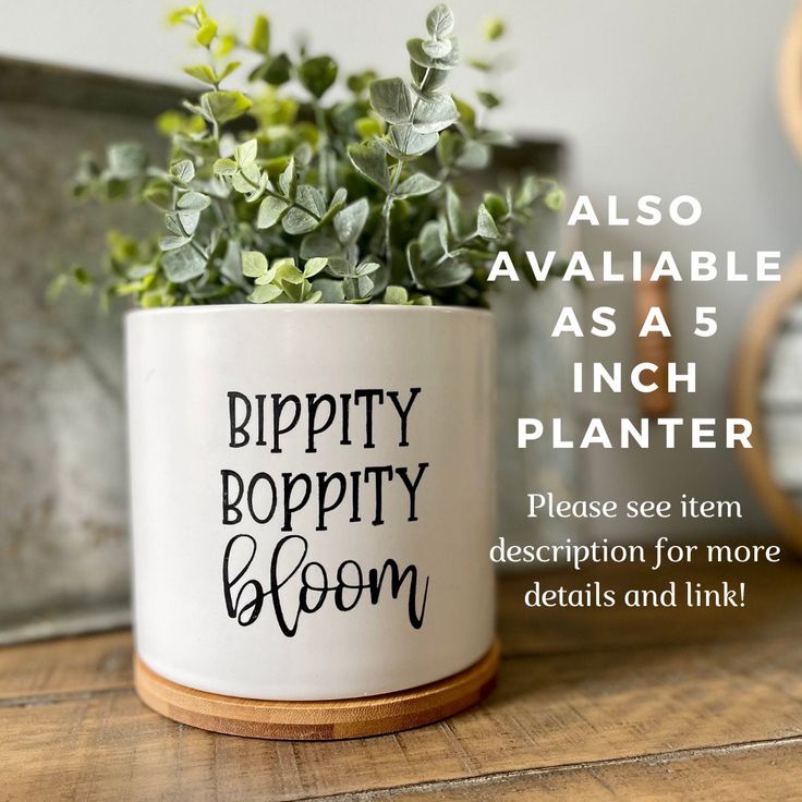 a plant in a mug with the words happy bloppty bloom on it