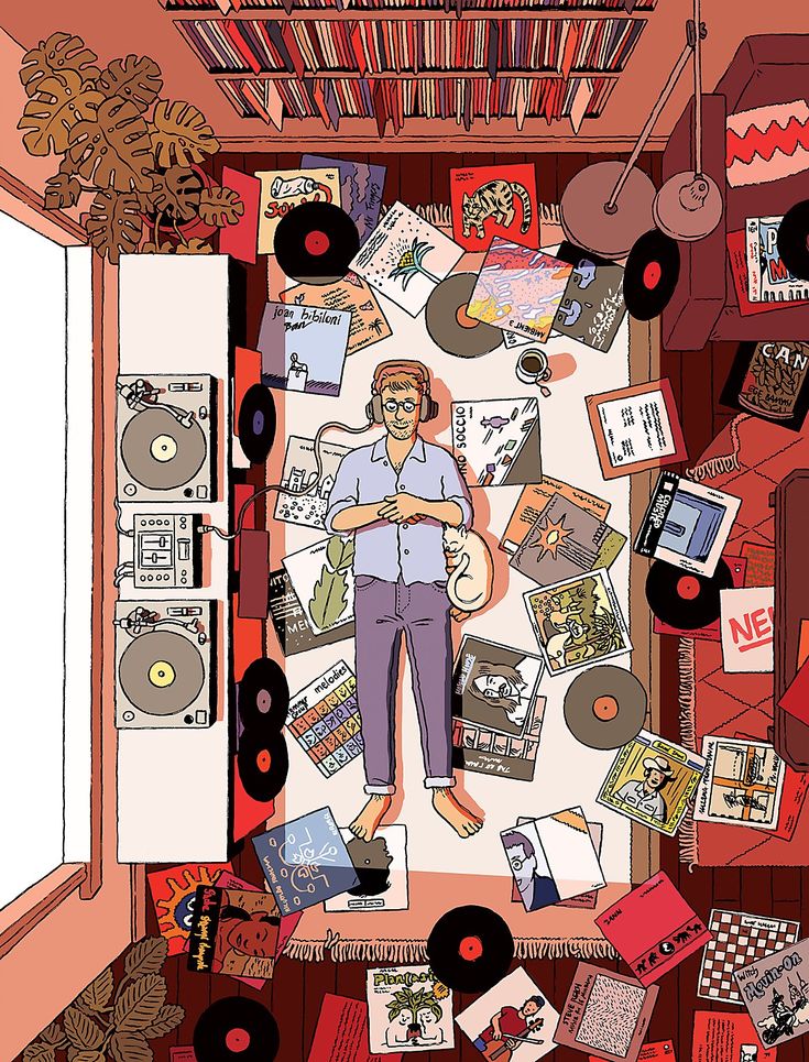 a man standing in the middle of a room filled with records