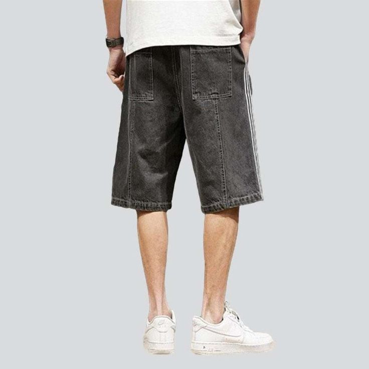 Come and experience the Nineties style with our 2023 Summer Collection free denim shorts featuring bands! These mid-rise shorts feature a drawstrings closure. and are made from stonewashed. stretchy fabric for a casual fit.Distinctive Features: 90's Style: Enjoy a blast from the past with these shorts that feature a distinctive look from the Nineties. Stonewashed: The stonewashed fabric adds a unique texture to the shorts. giving them a classic. vintage look. Loose Fit: With a loose fit. these s Sporty Jean Shorts With Built-in Shorts For Spring, Denim Cargo Shorts Casual, Sporty Short Jean Shorts For Summer, Sporty Jean Shorts For Summer, Sporty Summer Jean Shorts, Trendy Relaxed Fit Cargo Shorts For Summer, Sporty Cotton Jean Shorts For Summer, Sporty Denim Jean Shorts For Summer, Sporty Denim Bottoms For Summer