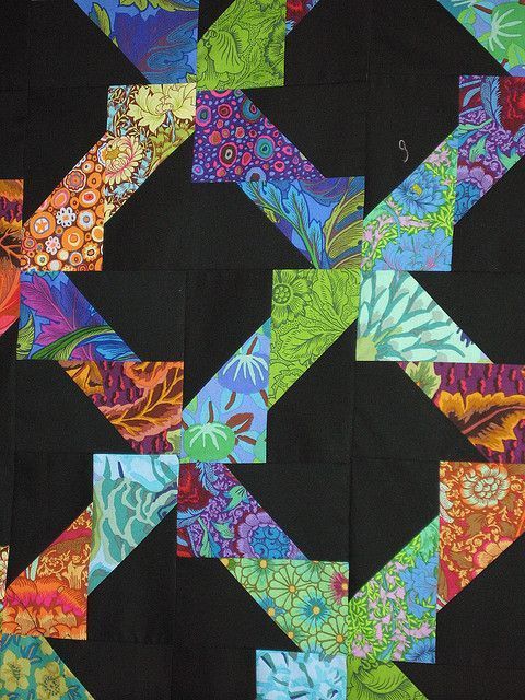 an image of a patchwork quilt that is very colorful