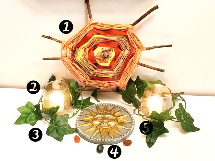 the instructions for how to make a paper sunflower vase with flowers and leaves around it