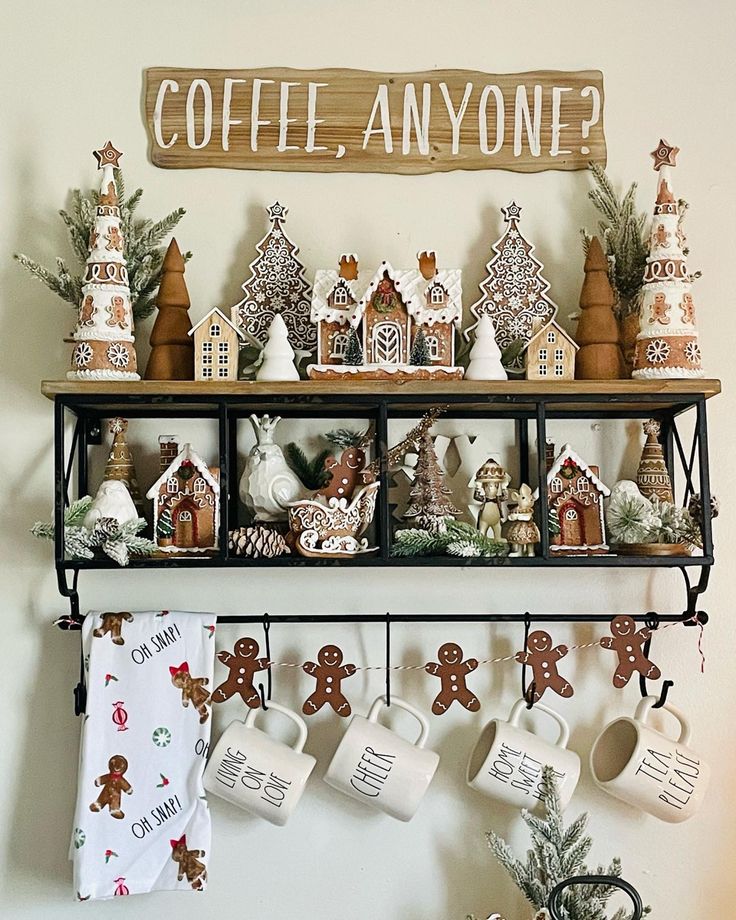 a shelf filled with coffee mugs and gingerbread houses