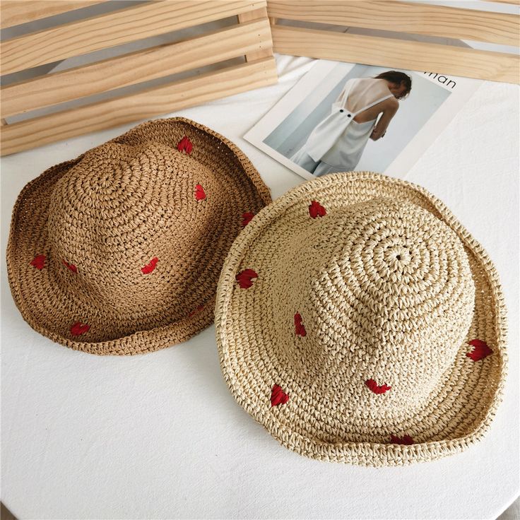 Meet your new favorite summer accessory - our Straw Embroidery Heart Hat! Crafted from lightweight and breathable straw material, this hat is all about comfort and style. Available in soft light brown and beige, it features a charming heart embroidery that adds a sweet touch. Whether you're headed to the beach or simply enjoying a sunny day in the city, this hat will keep you cool and stylish Straw Embroidery, Summer Beach Hats, Hats Cute, Embroidery Heart, Summer Hats Beach, Pastel Butterflies, Embroidery Hearts, Beach Hats, Cute Sun