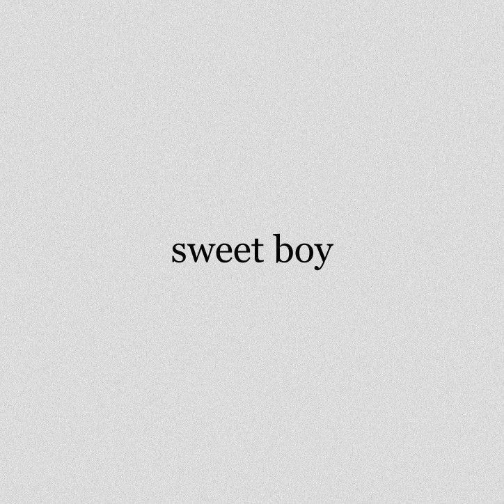 a black and white photo with the words sweet boy