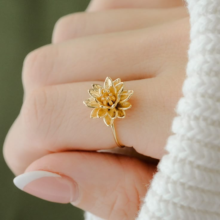 Title: Dainty Waterlily Ring Story: Dainty and delicate lotus flower ring. Material:  Solid 925 Silver, Vermeil (3 Micron 14k Gold Plating over Silver), and 14k Gold Plate over Brass Timeline:  Silver and 14k Gold Plate ship right away, Vermeil takes 2-3 weeks for me to make.  Deminsions: 1.3 mm band Special Options: Need alternative sizes or materials? Message me. I also offer this ring in solid gold.  Packaging: All items are nicely packaged and ready to gift in lovely jewelry boxes. The jewel Luxury Dainty Yellow Gold Flower Ring, Luxury Dainty Flower Ring, Luxury Gold Delicate Flower Ring, Affordable Gold Elegant Flower Ring, Affordable Elegant Midi Rings With Simple Design, Cheap Dainty Flower Ring For Gift, Cheap Elegant Gold Flower Ring, Gold Ring Flower Design, Cheap Adjustable Bohemian Flower Ring