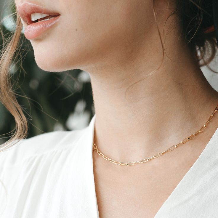 Our mini paperclip chain necklace is the perfect combo of sleek and minimalist. Wear it everyday for an easy, laid-back look. The built-in 3 inch extender makes it easy to layer and find the perfect fit.DETAILS:- 14kt gold filled or sterling silver- small link chain- 15 inches long with 3 inch extender- can be worn 15-18 inches Deer Jewelry, Paperclip Chain Necklace, Paperclip Necklace, Necklace Ideas, Fit Details, Layered Jewelry, Silver Chain Necklace, Gold Plated Chains, 14kt Gold