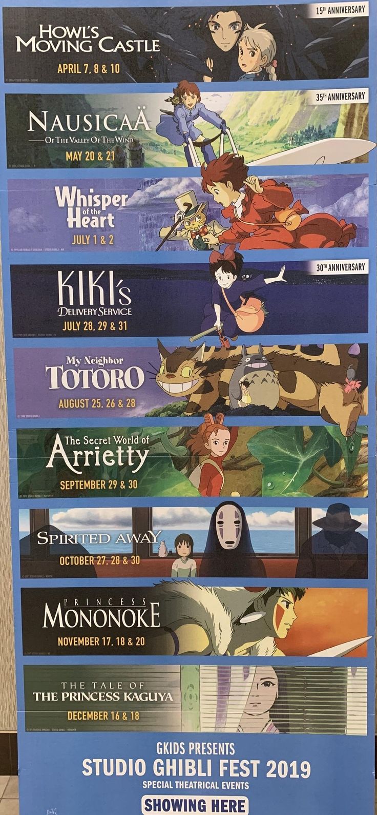 the poster for studio ghibli fest is displayed in front of a wall